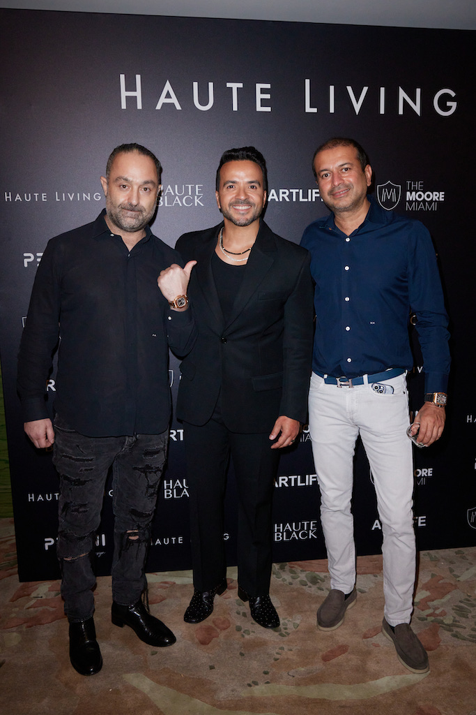 Art dealer Avery Andon, Luis Fonsi, and Kamal Hotchandani